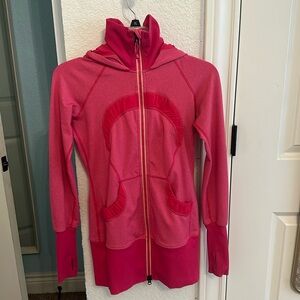 Hot pink lululemon zip up hoodie with pockets and thumb holes